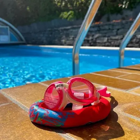 Sonnige Gartenwohnung Mit Pool Und Panoramasicht Brissago